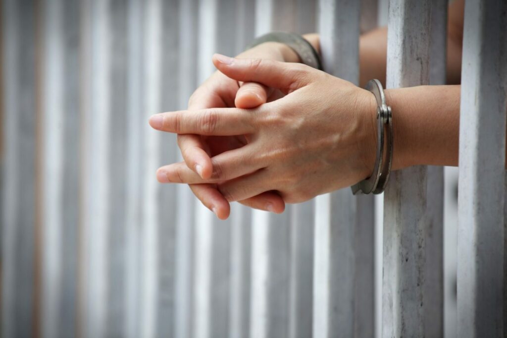 Handcuffed in county jail