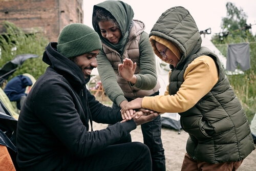 Father with his kids playing outside